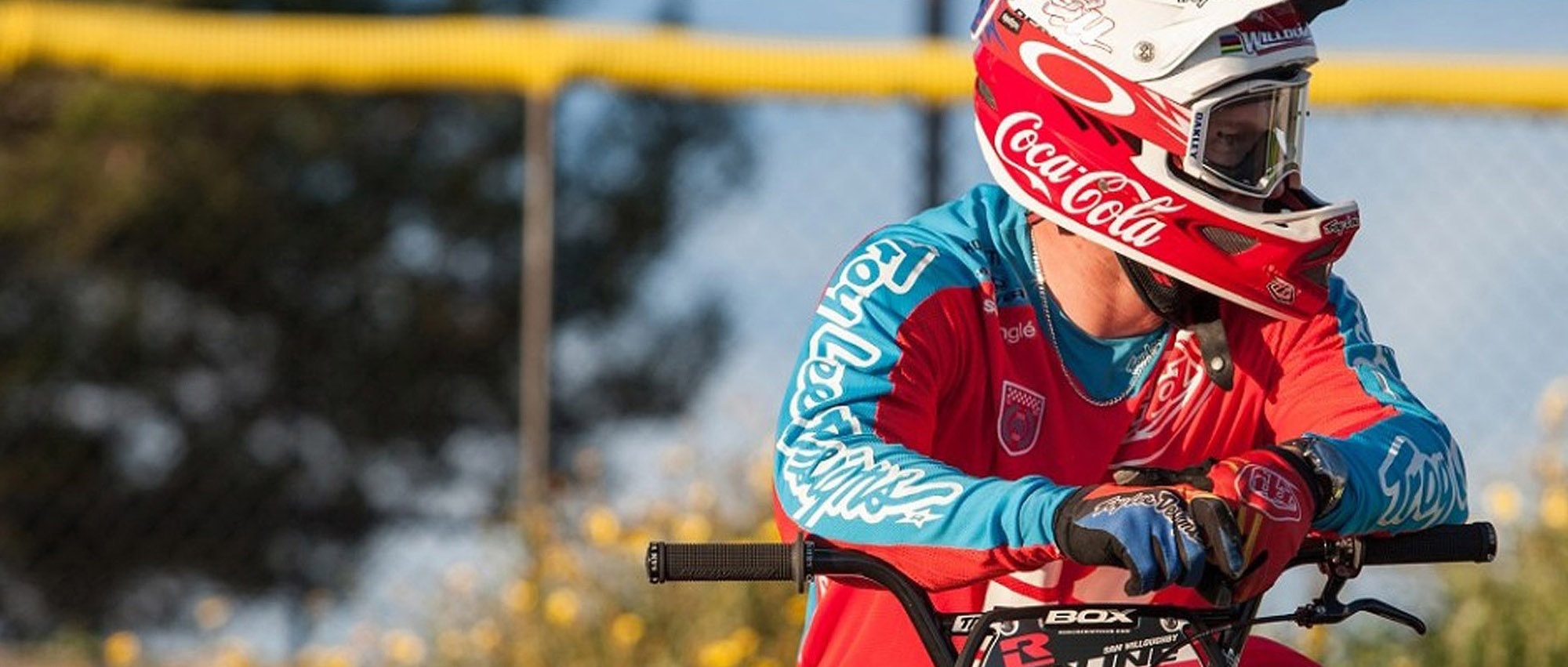 man wearing a helmet on a bmx bike